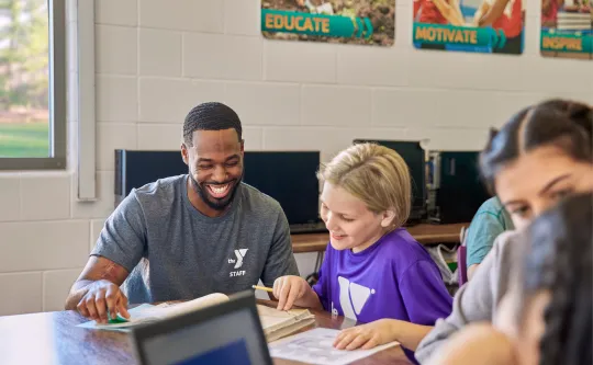 After school signature program students work on their homework